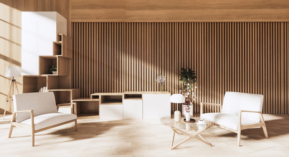 Un salon design moderne minimaliste et épuré mélangeant la couleur pure du blanc, la nuance du beige et le bois naturel. Douceur, calme et inspirant sont à l'honneur dans cette pièce.